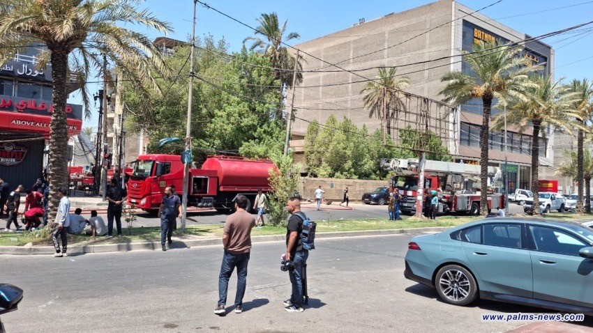 الدفاع المدني ينقذ 50 مواطناً ويخمد حريقاً في منطقة الكرادة ببغداد