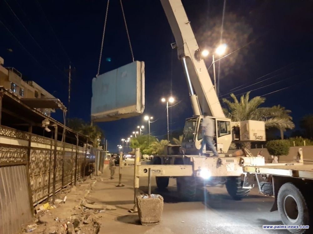 القوات الأمنية ترفع الصبات الكونكريتية من امام مجلس النواب