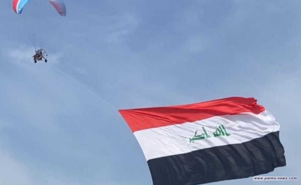 طيار شراعي عراقي يدخل موسوعة غينيس برفع أكبر علم ضمن الرياضة الجوية