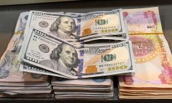 انخفاض سعر صرف الدولار في بورصة بغداد